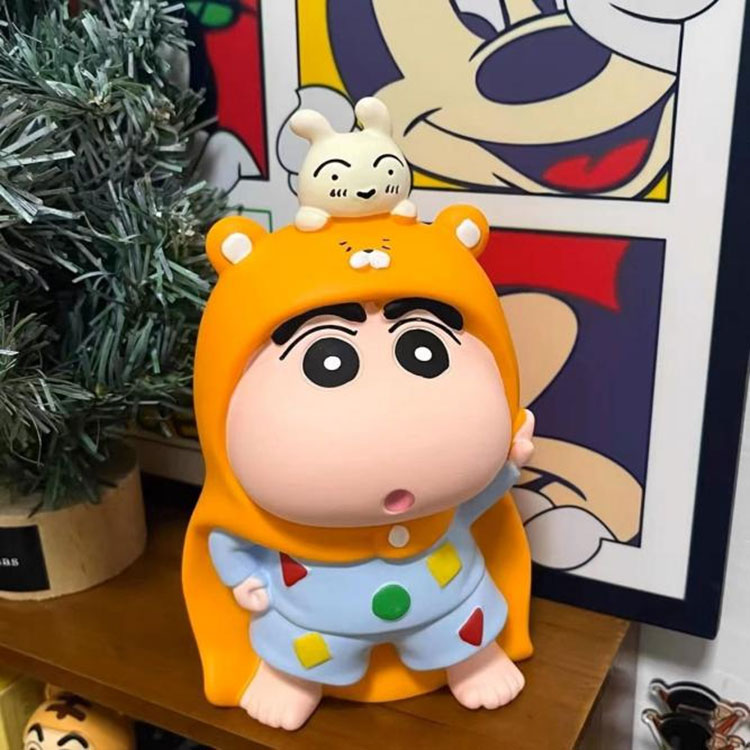 Does the Crayon Shin-chan Piggy Bank Come with a Built-in Sound Effect or Motion Feature